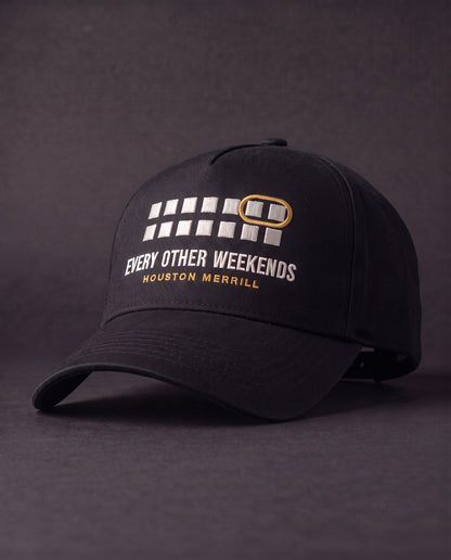 Every Other Weekends A-Frame Cap — front embroidery, calendar with one weekend circled