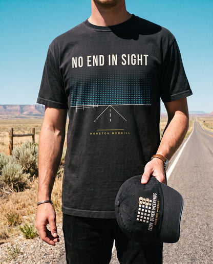 No End In Sight Horizon Tee worn on an open desert road